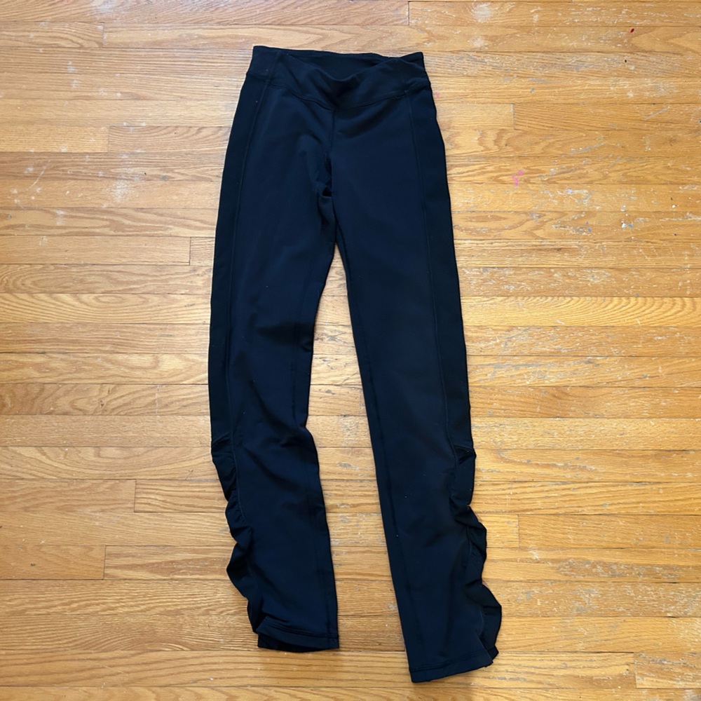 Ivivva Black High-Waisted Leggings with cute detailing on outer legs